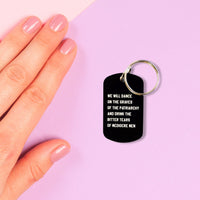 Dance on the Graves of the Patriarchy Dog Tag Keychain in Black, Laser Engraved