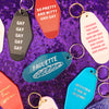 Nonbinary Space Communist Motel Style Keychain in Red and Gold