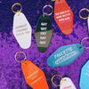 Nonbinary Space Communist Motel Style Keychain in Red and Gold