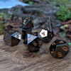 Black and Orange Sharp-Edged Metal Dice